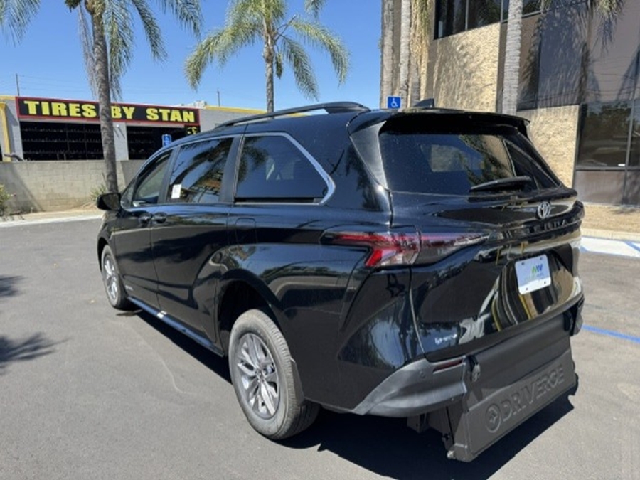 Black Toyota Sienna with Driverge Rear Entry Manual Fold Out conversion