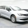 Silver Chrysler Voyager with BraunAbility Rear Entry Manual Fold Out conversion