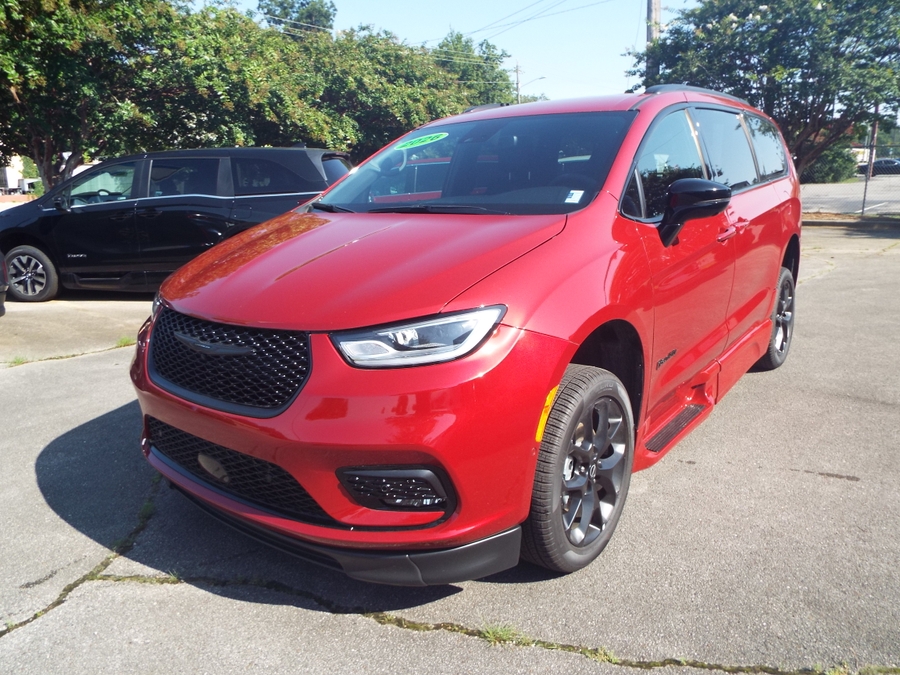 Red Chrysler Pacifica with BraunAbility Side Entry Automatic In Floor conversion