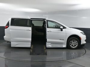 White Chrysler Voyager with BraunAbility Side Entry Automatic Fold Out conversion