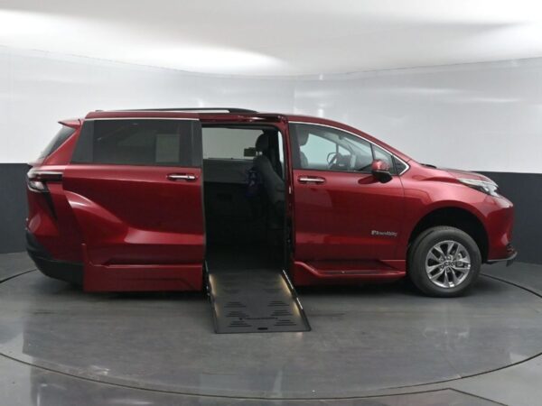Red Toyota Sienna with BraunAbility Side Entry Automatic Fold Out conversion