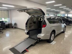 Silver Chrysler Pacifica with Driverge Rear Entry Manual Fold Out conversion