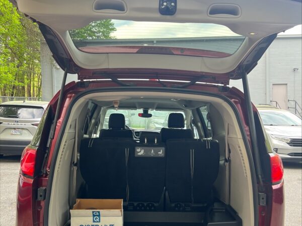 Red Chrysler Pacifica with Vantage Mobility Side Entry Automatic In Floor conversion