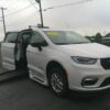 White Chrysler Pacifica with BraunAbility Side Entry Automatic Fold Out conversion