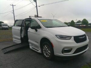 White Chrysler Pacifica with BraunAbility Side Entry Automatic Fold Out conversion