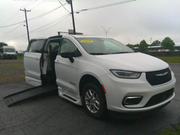 White Chrysler Pacifica with BraunAbility Side Entry Automatic Fold Out conversion