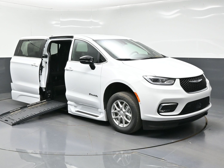 White Chrysler Pacifica with BraunAbility Side Entry Automatic Fold Out conversion