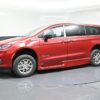 Red Chrysler Pacifica with BraunAbility Side Entry Automatic In Floor conversion