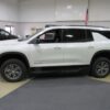 White Chevrolet Traverse with BraunAbility Side Entry Automatic In Floor conversion
