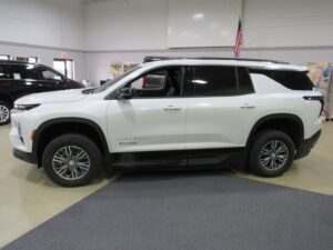 White Chevrolet Traverse with BraunAbility Side Entry Automatic In Floor conversion