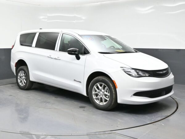 White Chrysler Voyager with BraunAbility Rear Entry Manual Fold Out conversion