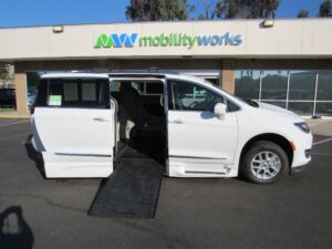 White Chrysler Pacifica with BraunAbility Side Entry Automatic In Floor conversion