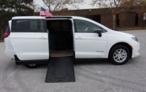 White Chrysler Voyager with BraunAbility Side Entry Manual Fold Out conversion