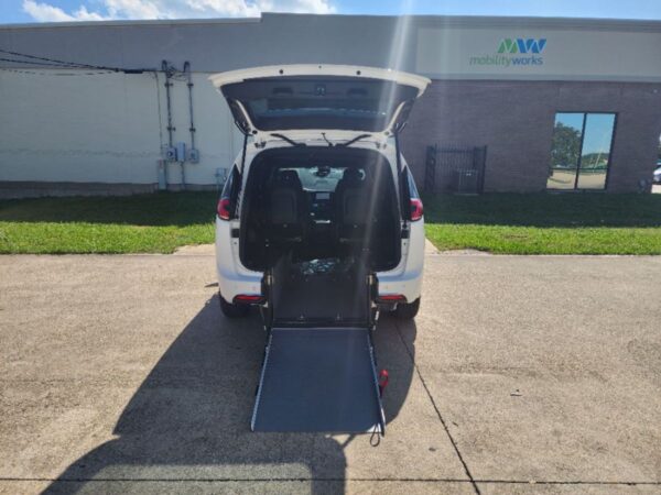 White Chrysler Pacifica with Driverge Rear Entry Manual Fold Out conversion