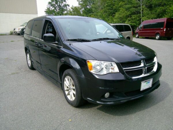 Black Dodge Grand Caravan with BraunAbility Side Entry Automatic Fold Out conversion