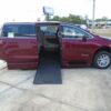 Red Chrysler Voyager with BraunAbility Side Entry Automatic In Floor conversion