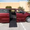 Red Chrysler Voyager with BraunAbility Side Entry Automatic Fold Out conversion