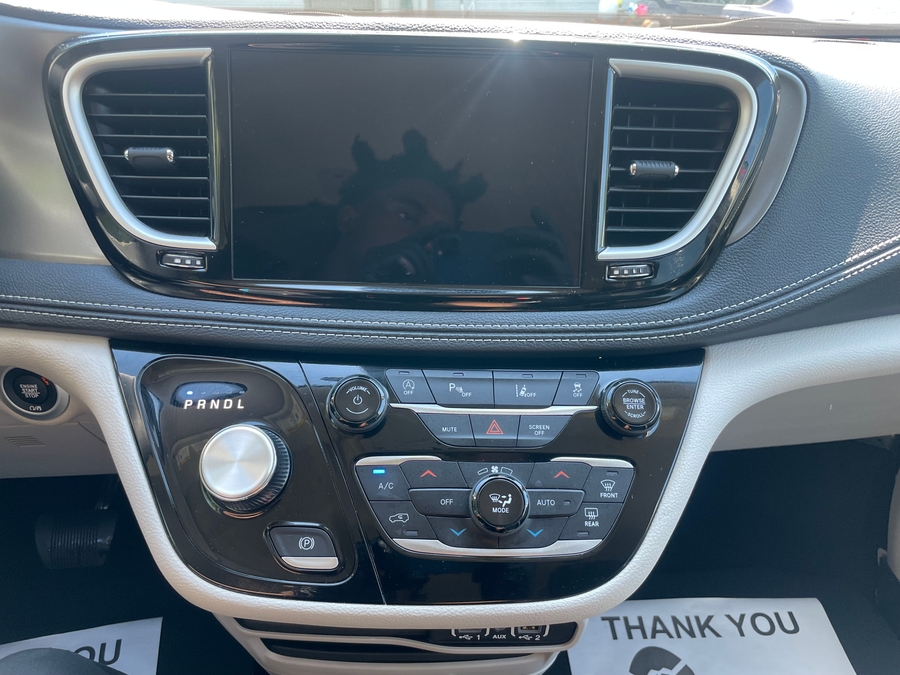 Red Chrysler Pacifica with Driverge Side Entry Automatic Fold Out conversion