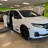 White Honda Odyssey with BraunAbility Side Entry Automatic In Floor conversion