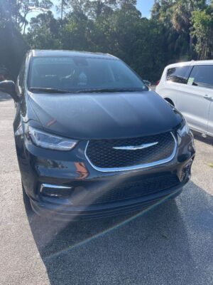 Black Chrysler Pacifica with BraunAbility Side Entry Automatic Fold Out conversion