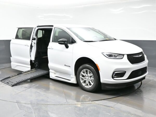 White Chrysler Pacifica with BraunAbility Side Entry Automatic Fold Out conversion