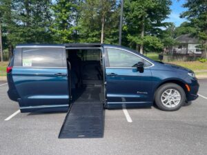Blue Chrysler Pacifica with BraunAbility Side Entry Automatic Fold Out conversion