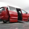 Red Chrysler Pacifica with BraunAbility Side Entry Automatic In Floor conversion