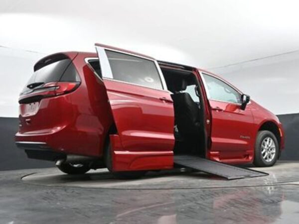 Red Chrysler Pacifica with BraunAbility Side Entry Automatic In Floor conversion