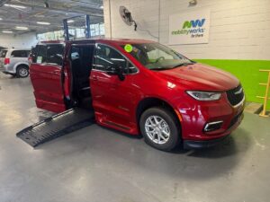 Red Chrysler Pacifica with BraunAbility Side Entry Automatic Fold Out conversion