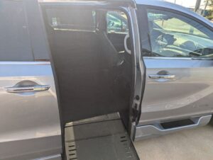 Silver Honda Odyssey with BraunAbility Side Entry Automatic In Floor conversion