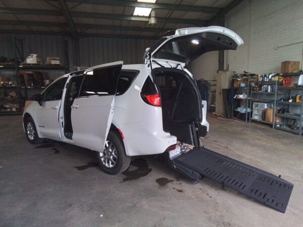 White Chrysler Voyager with BraunAbility Rear Entry Manual Fold Out conversion