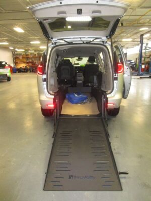 Silver Chrysler Voyager with BraunAbility Rear Entry Manual Fold Out conversion