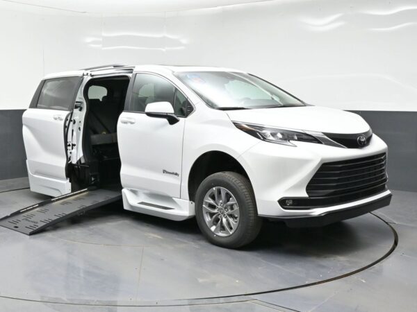White Toyota Sienna with BraunAbility Side Entry Automatic Fold Out conversion