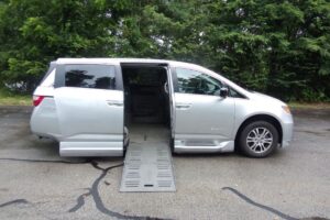 Silver Honda Odyssey with BraunAbility Side Entry Automatic Fold Out conversion