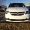 White Dodge Grand Caravan with Driverge Rear Entry Manual Fold Out conversion