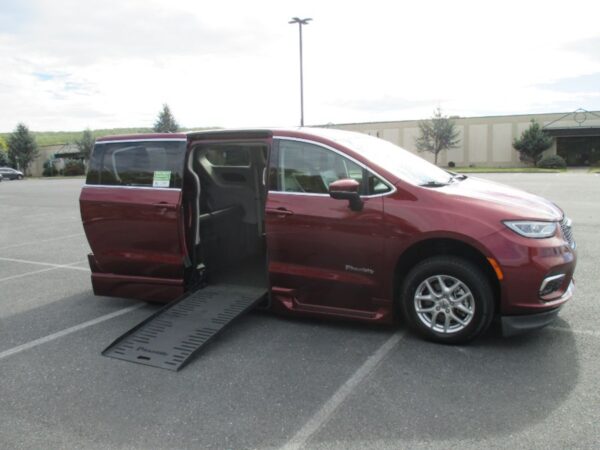 Red Chrysler Pacifica with BraunAbility Side Entry Automatic Fold Out conversion
