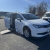 White Chrysler Voyager with BraunAbility Side Entry Automatic In Floor conversion