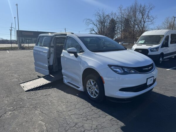 White Chrysler Voyager with BraunAbility Side Entry Automatic In Floor conversion