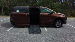 Orange Toyota Sienna with BraunAbility Side Entry Automatic Fold Out conversion