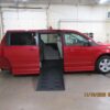 Red Dodge Grand Caravan with BraunAbility Side Entry Automatic Fold Out conversion