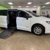 White Chrysler Voyager with Driverge Side Entry Automatic Fold Out conversion