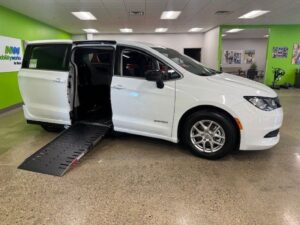 White Chrysler Voyager with Driverge Side Entry Automatic Fold Out conversion