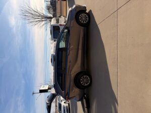 Grey Toyota Sienna with Driverge Rear Entry Manual Fold Out conversion