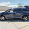 Blue Toyota Sienna with Driverge Rear Entry Manual Fold Out conversion