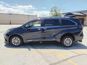 Blue Toyota Sienna with Driverge Rear Entry Manual Fold Out conversion