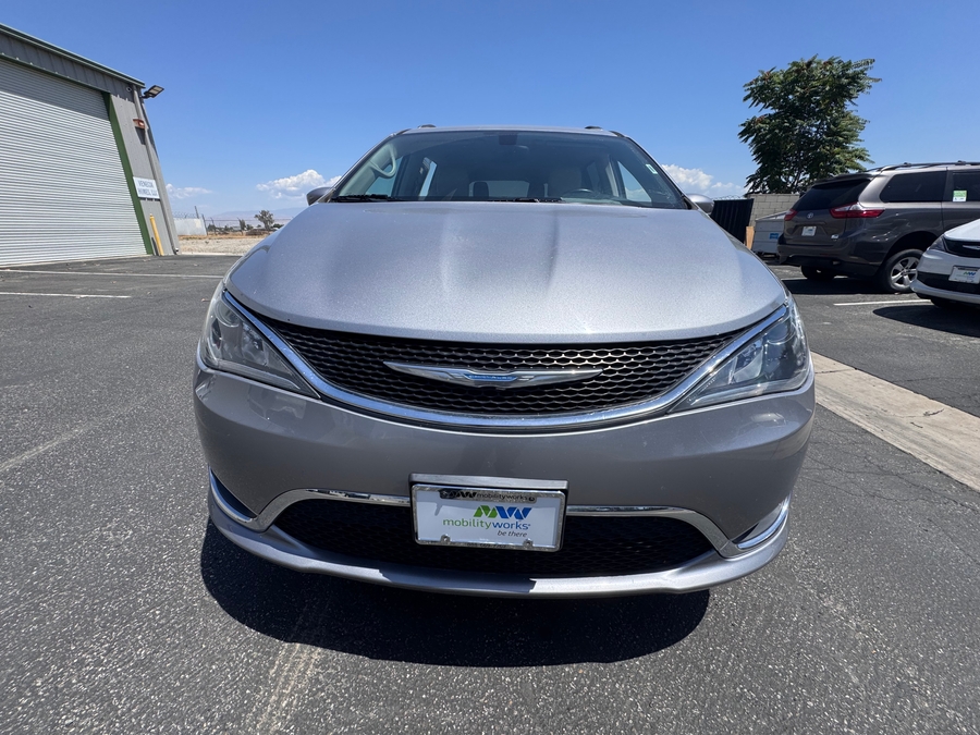 Silver Chrysler Pacifica with Vantage Mobility Side Entry Automatic In Floor conversion