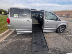 Silver Dodge Grand Caravan with BraunAbility Side Entry Automatic Fold Out conversion