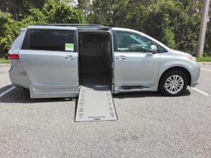 Silver Toyota Sienna with BraunAbility Side Entry Automatic In Floor conversion