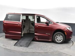 Red Chrysler Voyager with BraunAbility Side Entry Automatic Fold Out conversion