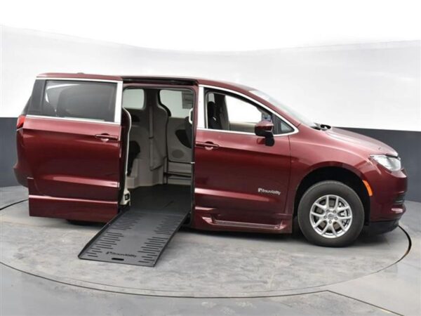 Red Chrysler Voyager with BraunAbility Side Entry Automatic Fold Out conversion